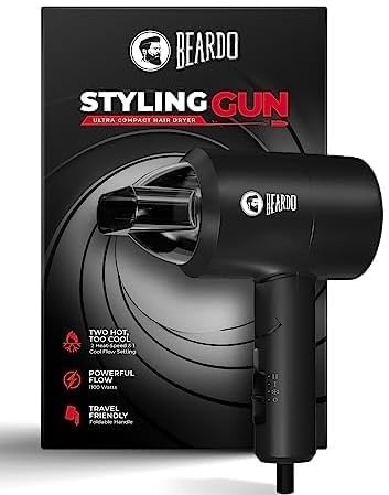 Compact hair dryer for men with 3 heat and 2 speed settings, perfect for travel. Stylish matte black finish.