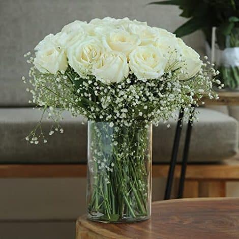 Valentine’s Day gift with 30 fresh white roses in a glass vase, delivered the same day.