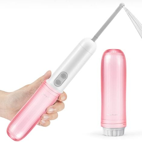 Travel Electric Bidet Sprayer: Cleanse and rejuvenate yourself on-the-go with this portable, 2-pressure option, pink personal hygiene device.