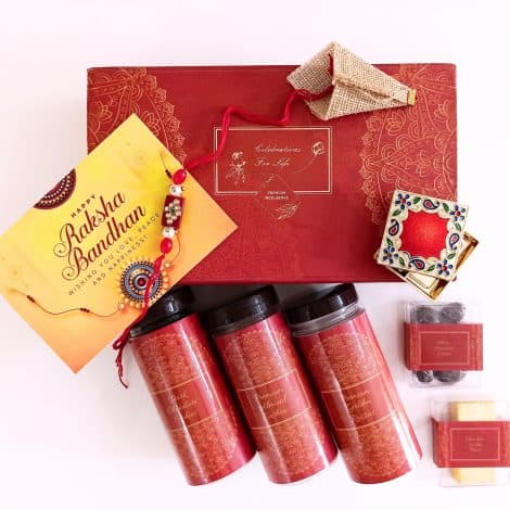 Rakhi gift box for your brother, packed with dark chocolate cookies, chocolates, and dry fruits.