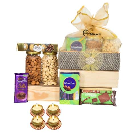 New Year Dry Fruits Gift Basket: Nutri Surprise for Family, Friends, or Corporate Gifting with Chocolates and Diyas.